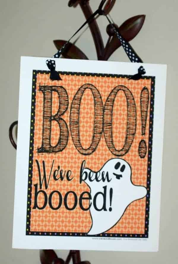 Free Printable Halloween Boo Sign.  Surprise your neighbors with a special Halloween treat!  Grab a FREE Printable Halloween Boo Sign!!!  #halloween #holiday #free #printables #freeprintable #ghost